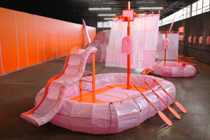 Large-scale installation with sculptural elements and fifteen projected videos exploring fear, safety culture, and the perception of everyday risk.